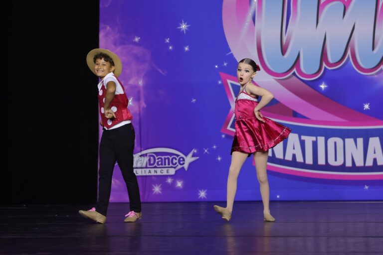 Born Dance Academy dancers in costume on stage